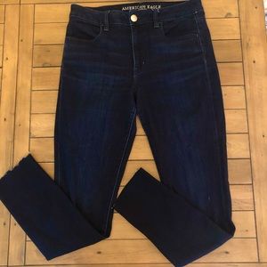 High-rise raw hem dark wash jegging